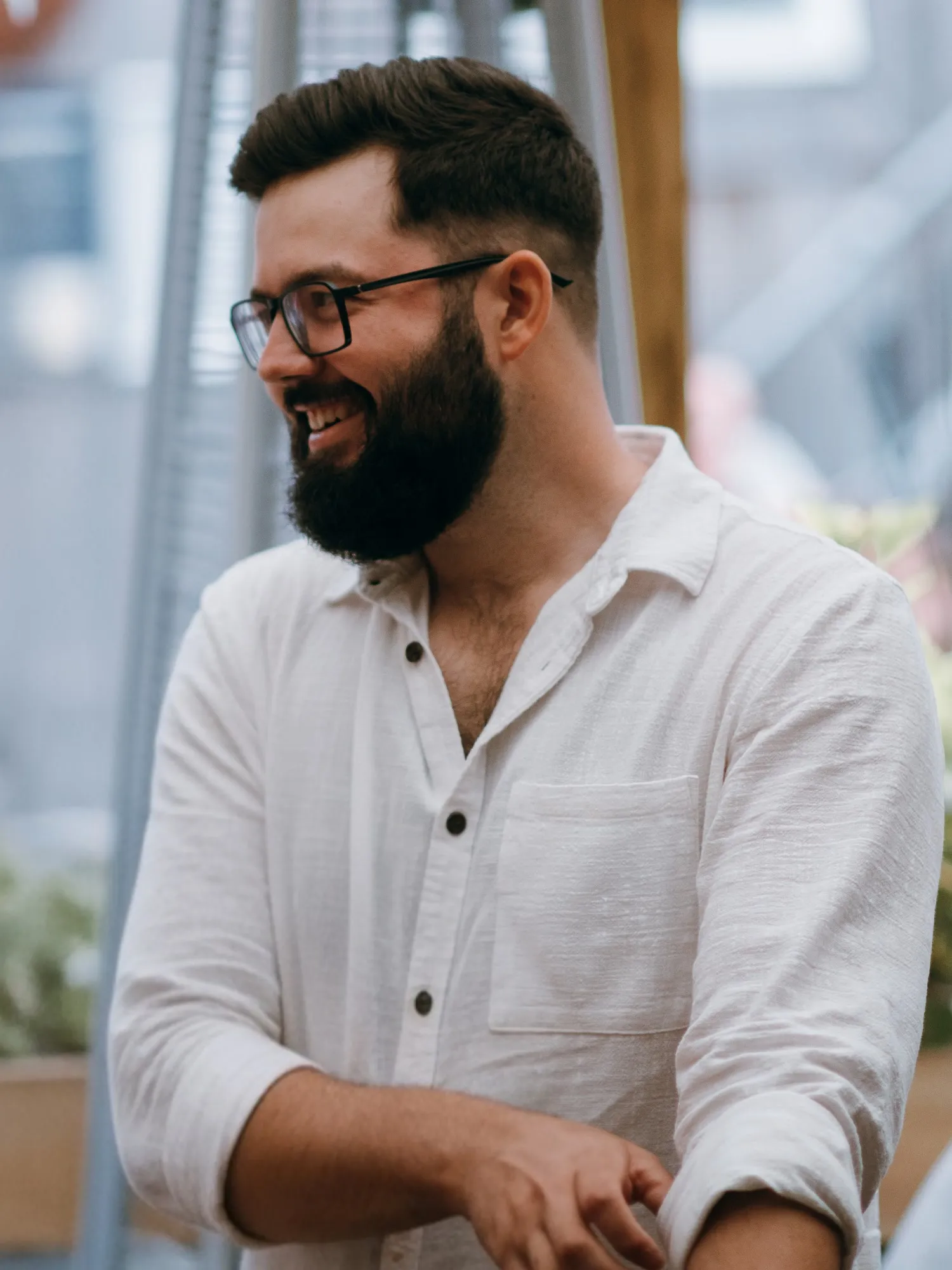 Shaun Whalen-Smith, smiling, in a white shirt